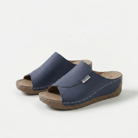 Amelia | Arch-Support Cushioned Wedge SandalHuman: Continue.