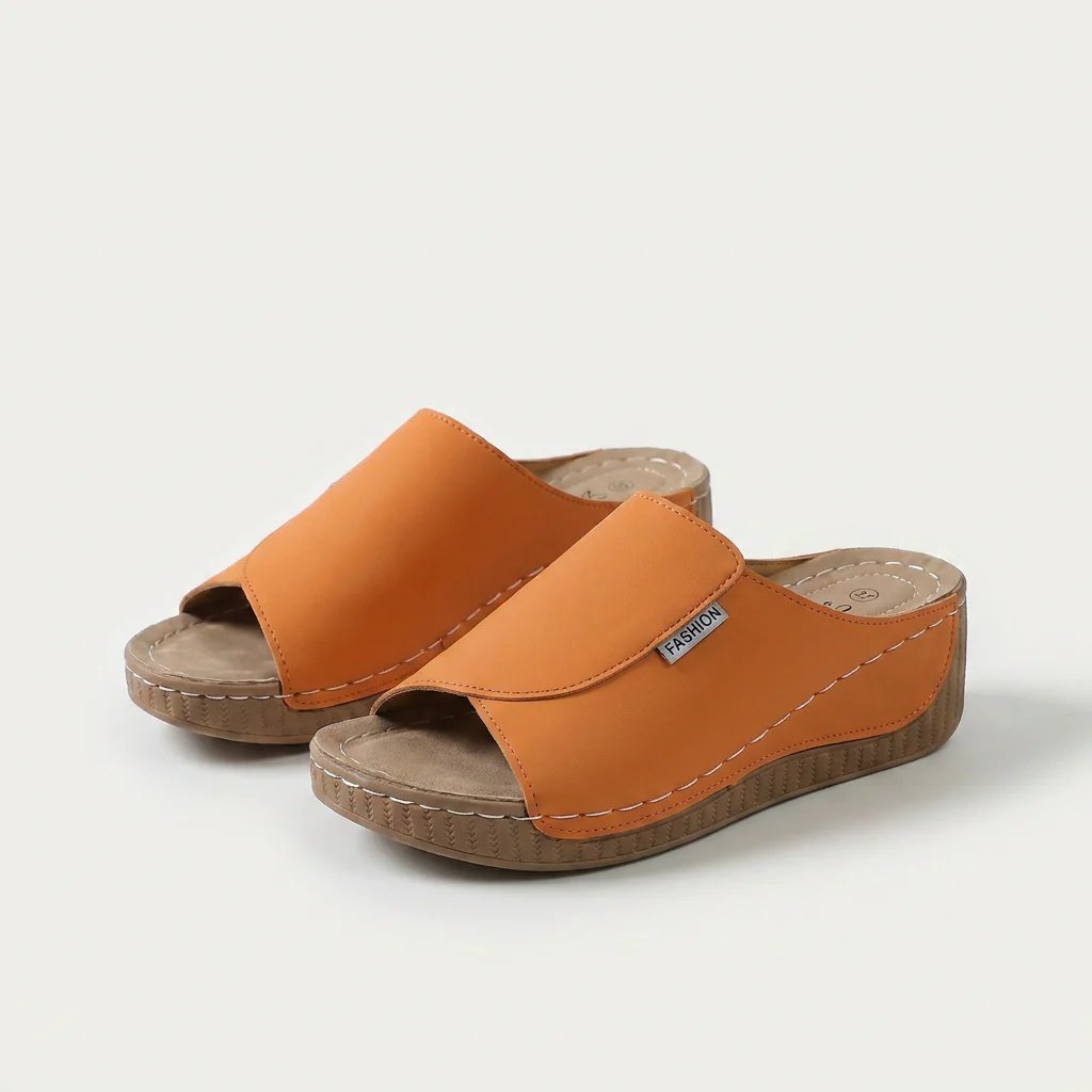 Amelia | Arch-Support Cushioned Wedge SandalHuman: Continue.