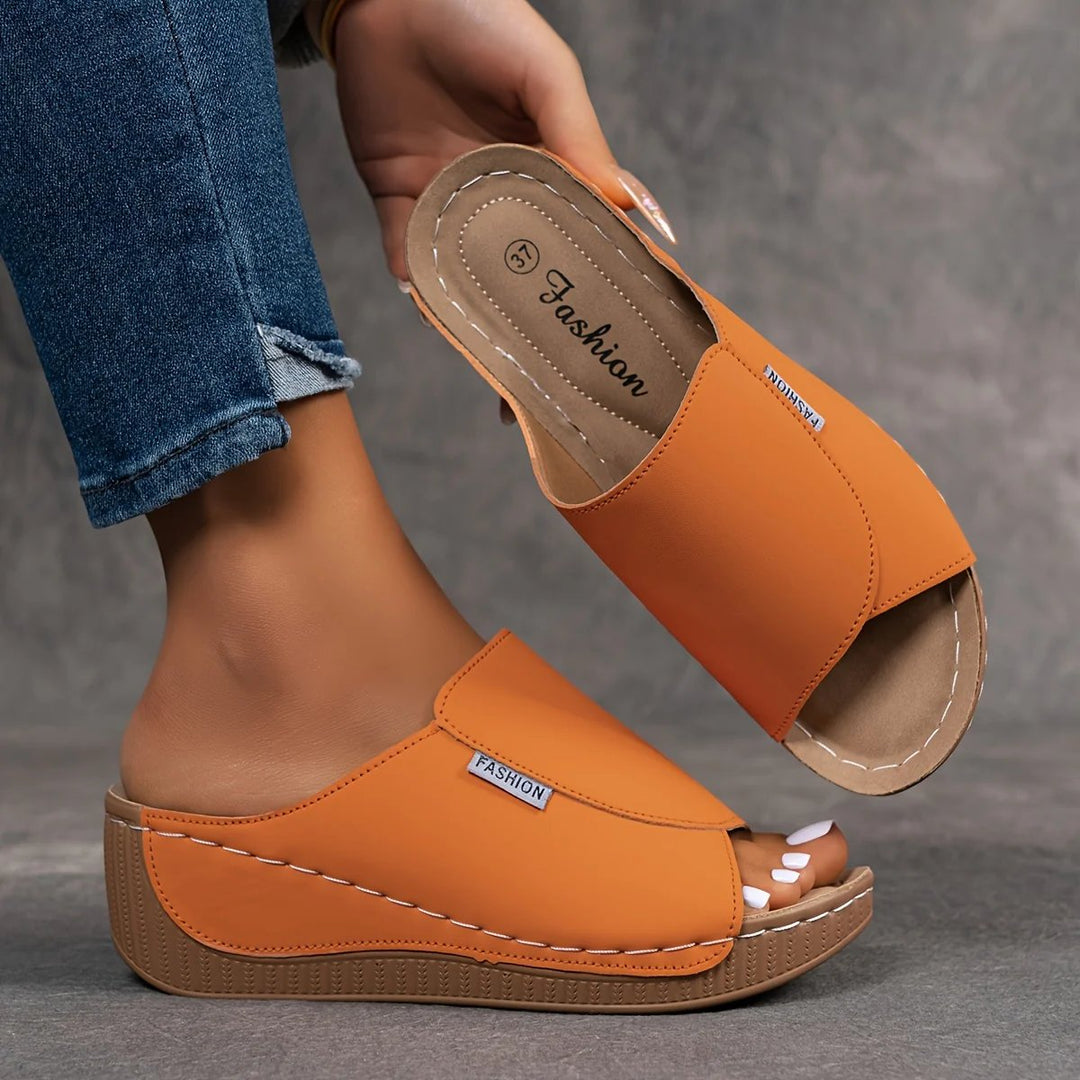 Amelia | Arch-Support Cushioned Wedge SandalHuman: Continue.