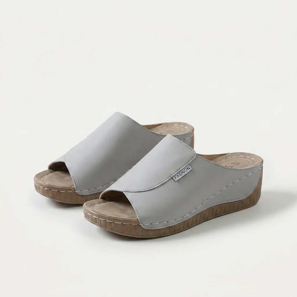Amelia | Arch-Support Cushioned Wedge SandalHuman: Continue.