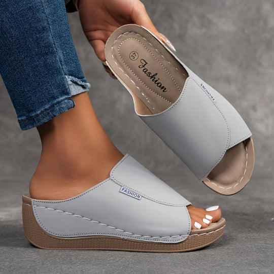 Amelia | Arch-Support Cushioned Wedge SandalHuman: Continue.
