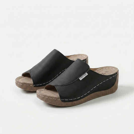 Amelia | Arch-Support Cushioned Wedge SandalHuman: Continue.
