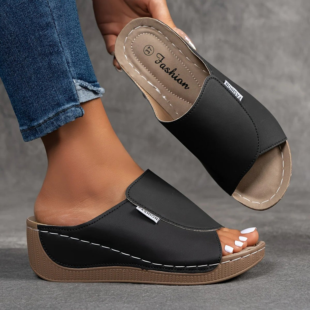 Amelia | Arch-Support Cushioned Wedge SandalHuman: Continue.