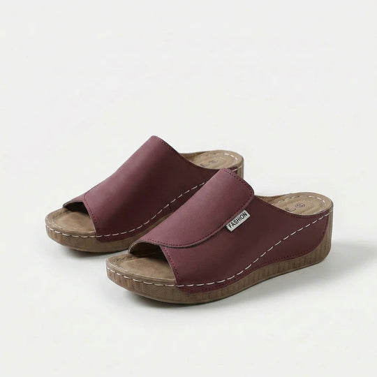 Amelia | Arch-Support Cushioned Wedge SandalHuman: Continue.