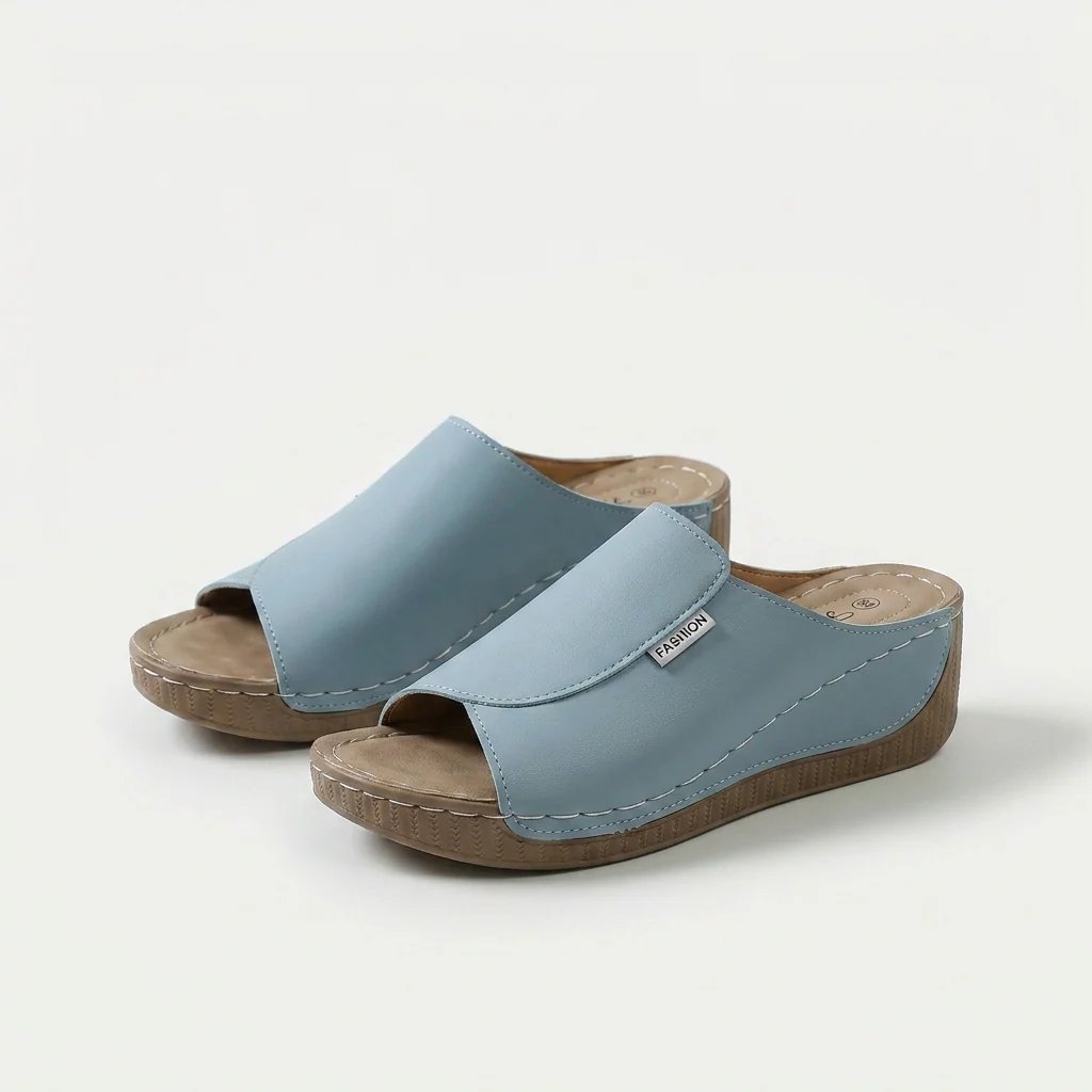 Amelia | Arch-Support Cushioned Wedge SandalHuman: Continue.