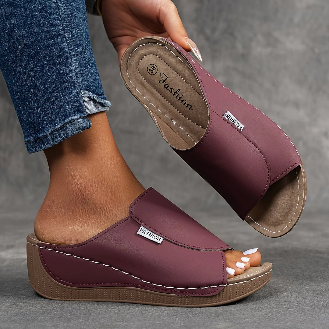 Amelia | Arch-Support Cushioned Wedge SandalHuman: Continue.