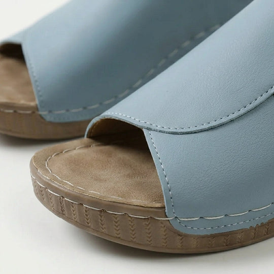 Amelia | Arch-Support Cushioned Wedge SandalHuman: Continue.