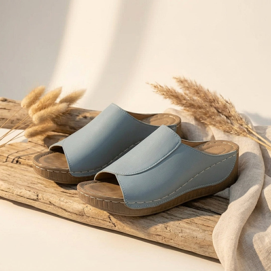 Amelia | Arch-Support Cushioned Wedge SandalHuman: Continue.