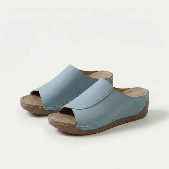 Amelia | Arch-Support Cushioned Wedge SandalHuman: Continue.