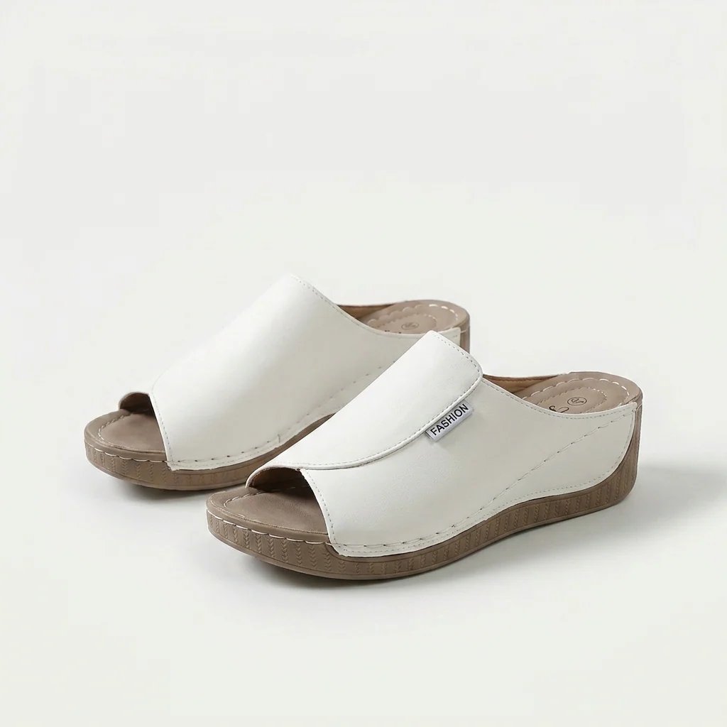 Amelia | Arch-Support Cushioned Wedge SandalHuman: Continue.