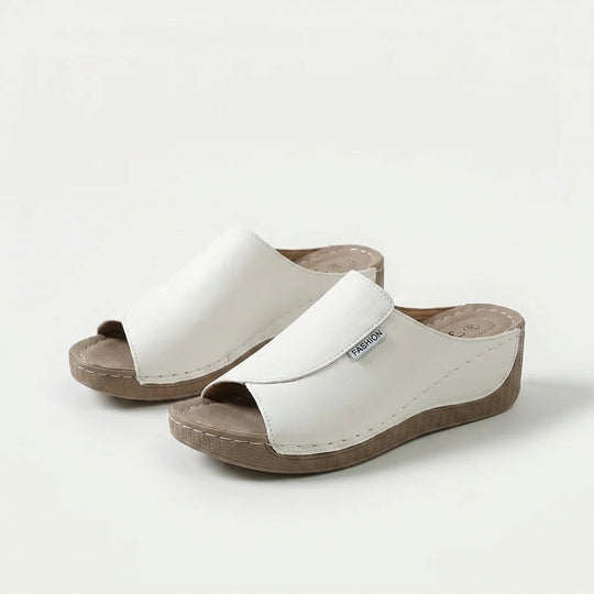 Amelia | Arch-Support Cushioned Wedge SandalHuman: Continue.