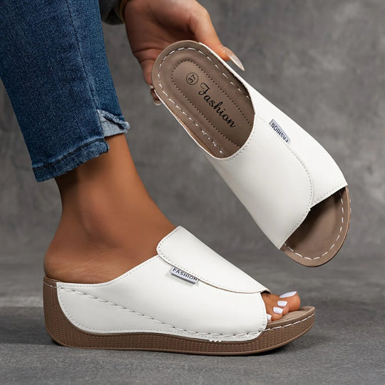 Amelia | Arch-Support Cushioned Wedge SandalHuman: Continue.