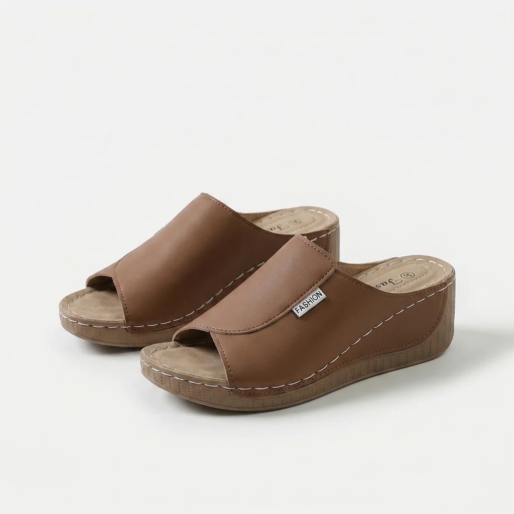 Amelia | Arch-Support Cushioned Wedge SandalHuman: Continue.