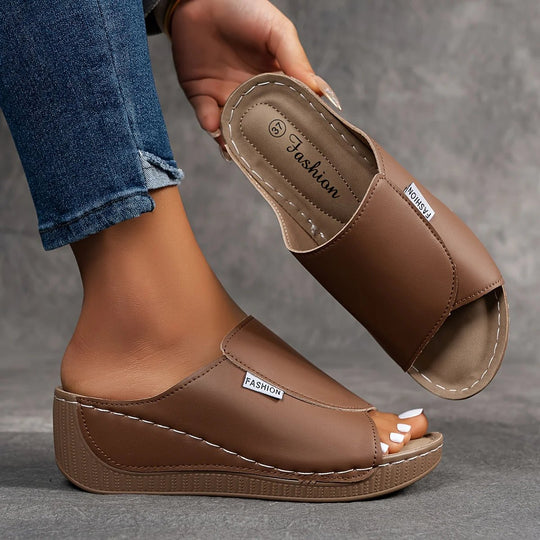 Amelia | Arch-Support Cushioned Wedge SandalHuman: Continue.