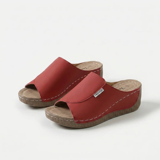 Amelia | Arch-Support Cushioned Wedge SandalHuman: Continue.